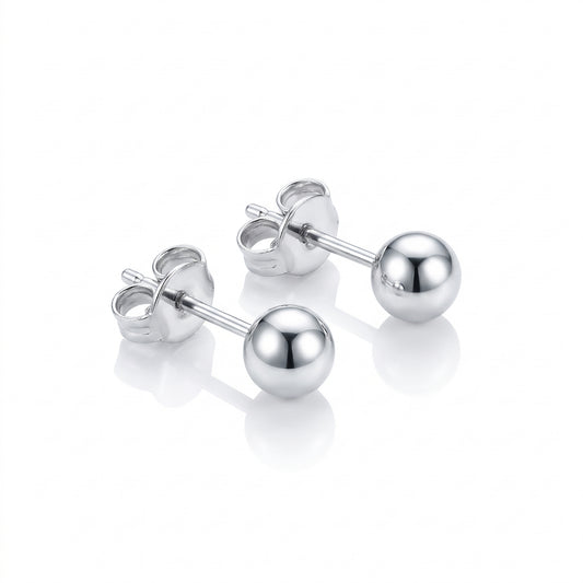 A pair of polished platinum ball stud earrings with butterfly backings, displayed on a clean white background with soft reflections.