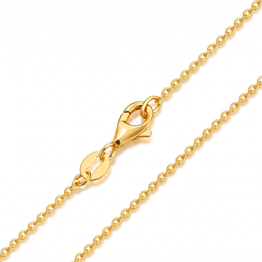 HELIOR 1.1mm 18K yellow gold cable chain necklace, close-up of oval links and lobster clasp.