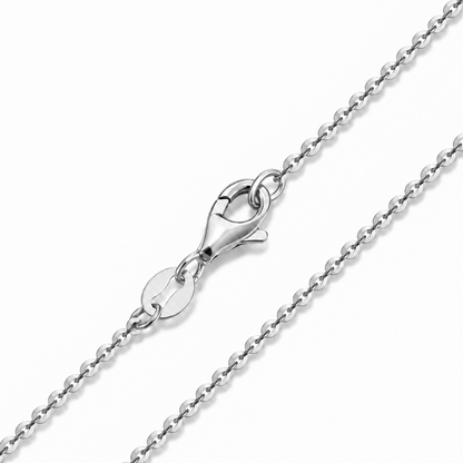 HELIOR 1.5mm 18K white gold cable chain necklace, close-up of oval links and lobster clasp.