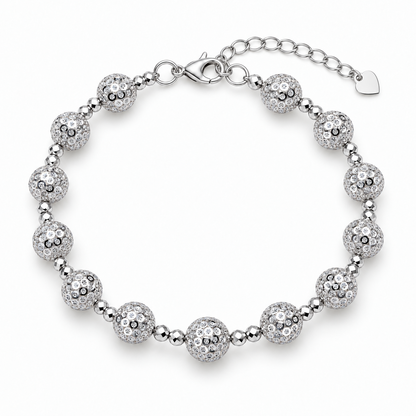 Full view of HELIOR Aster 8mm platinum bead bracelet with lobster clasp, oval-link extension chain and heart-shaped end tag.