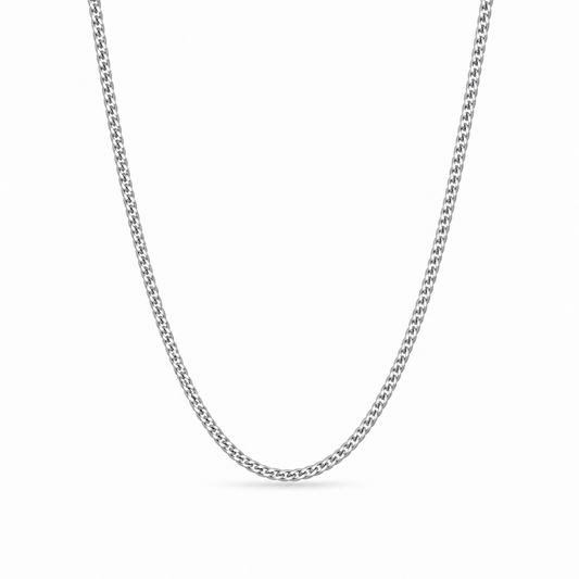 Cadence Fine 1.6mm solid PT950 platinum curb chain necklace by HELIOR on a white background.