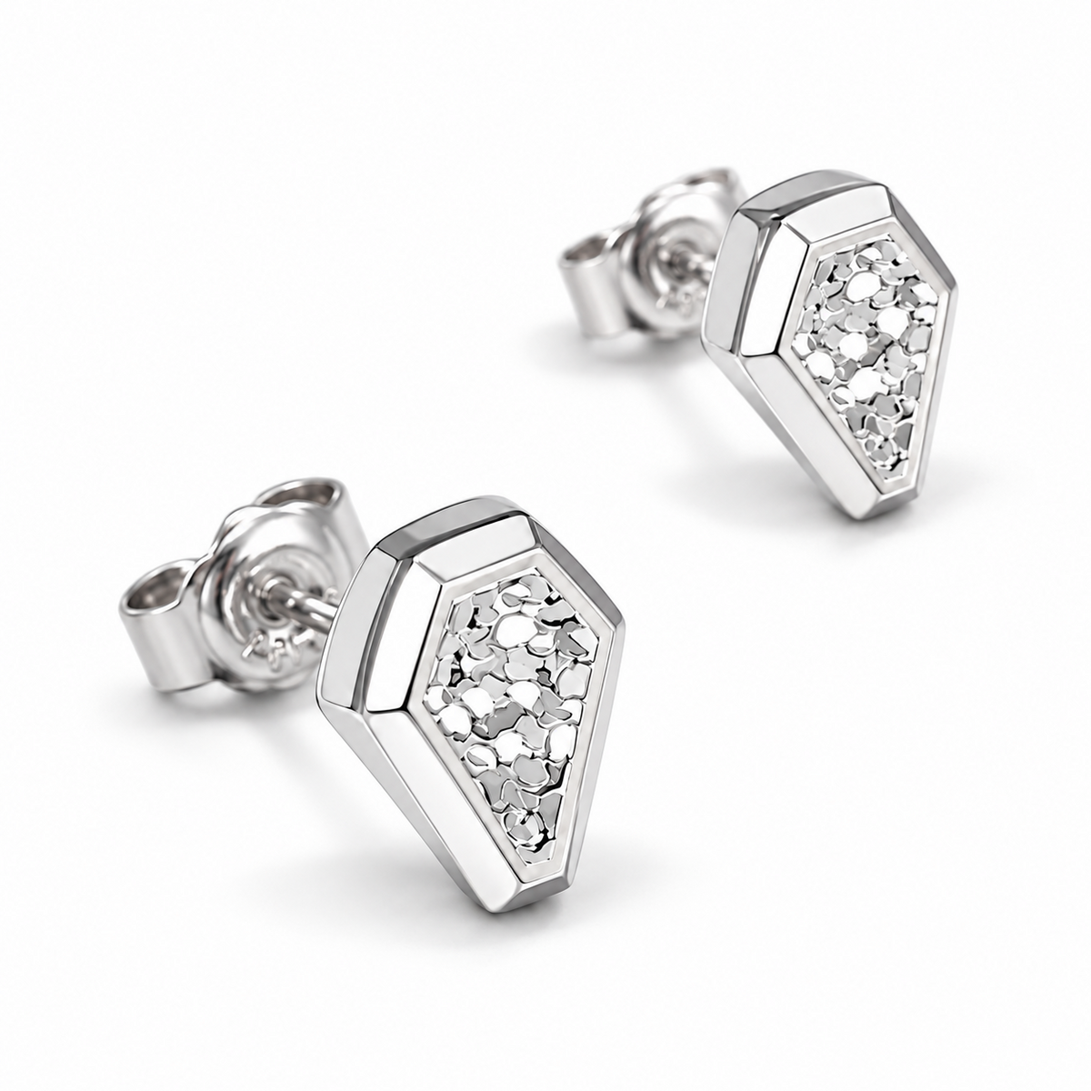 Angled view of HELIOR Crest platinum stud earrings showing posts and butterfly backs