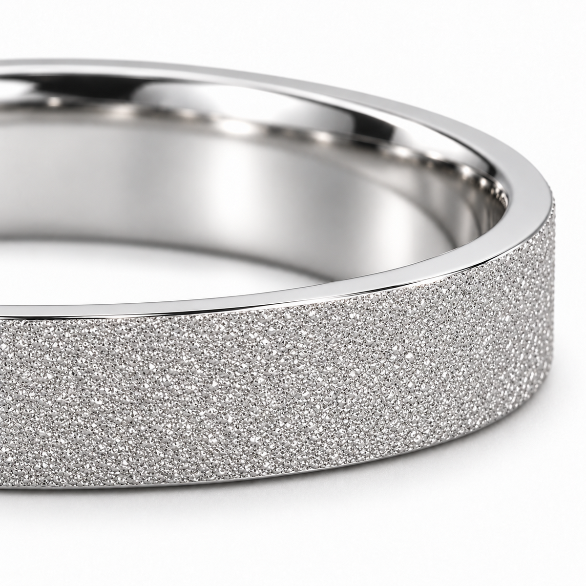 Close-up of the Dune platinum band's fine frosted texture, clean edge and polished interior.