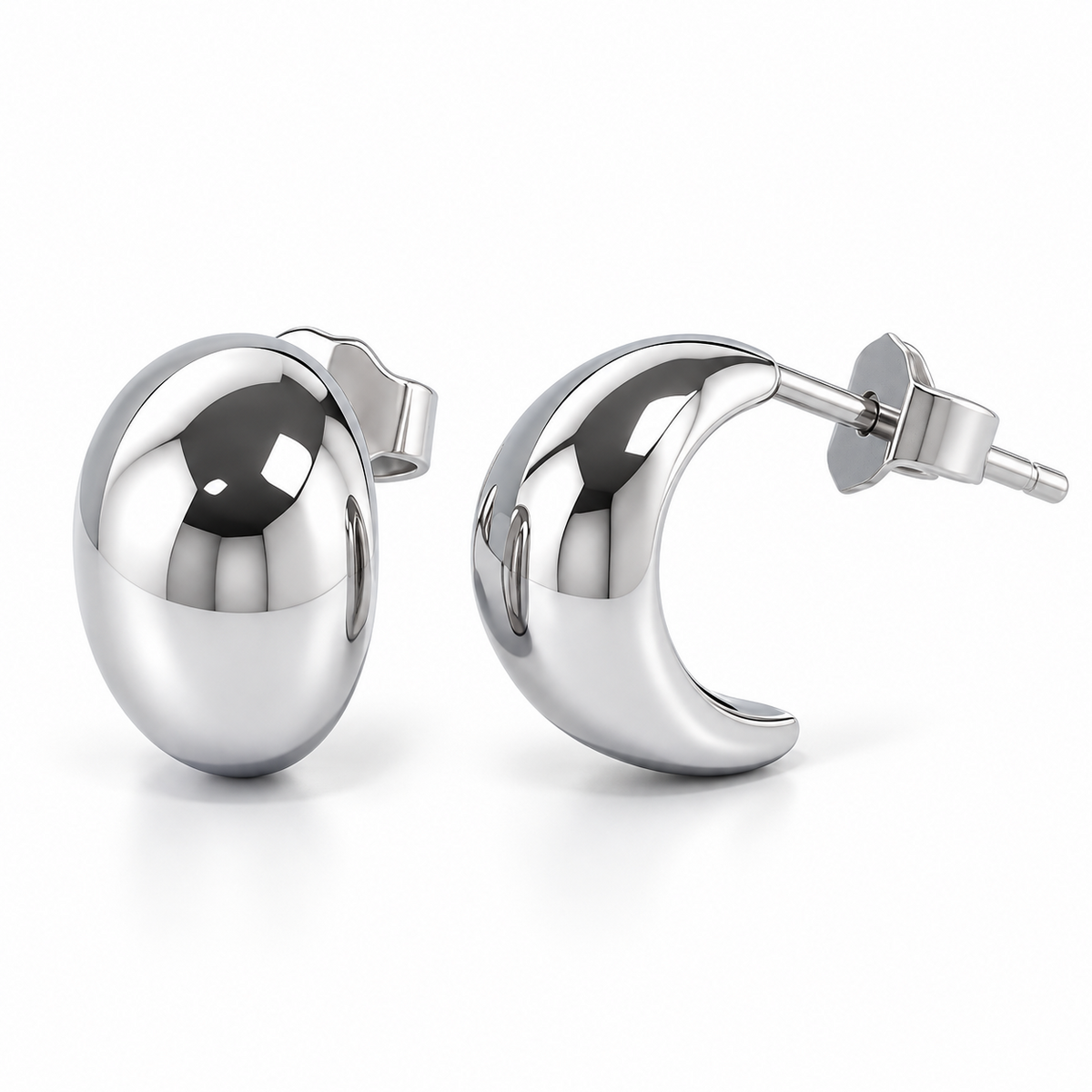 Angled view of HELIOR PT950 platinum moon stud earrings showing the curved side profile, posts and butterfly backs