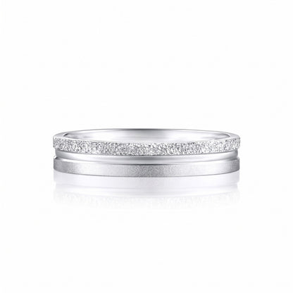 Strata solid PT950 platinum textured band on white, showing faceted, polished and matte finishes