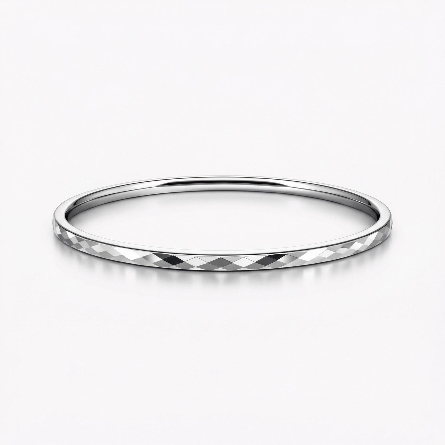 Angled view of 3mm faceted platinum bangle