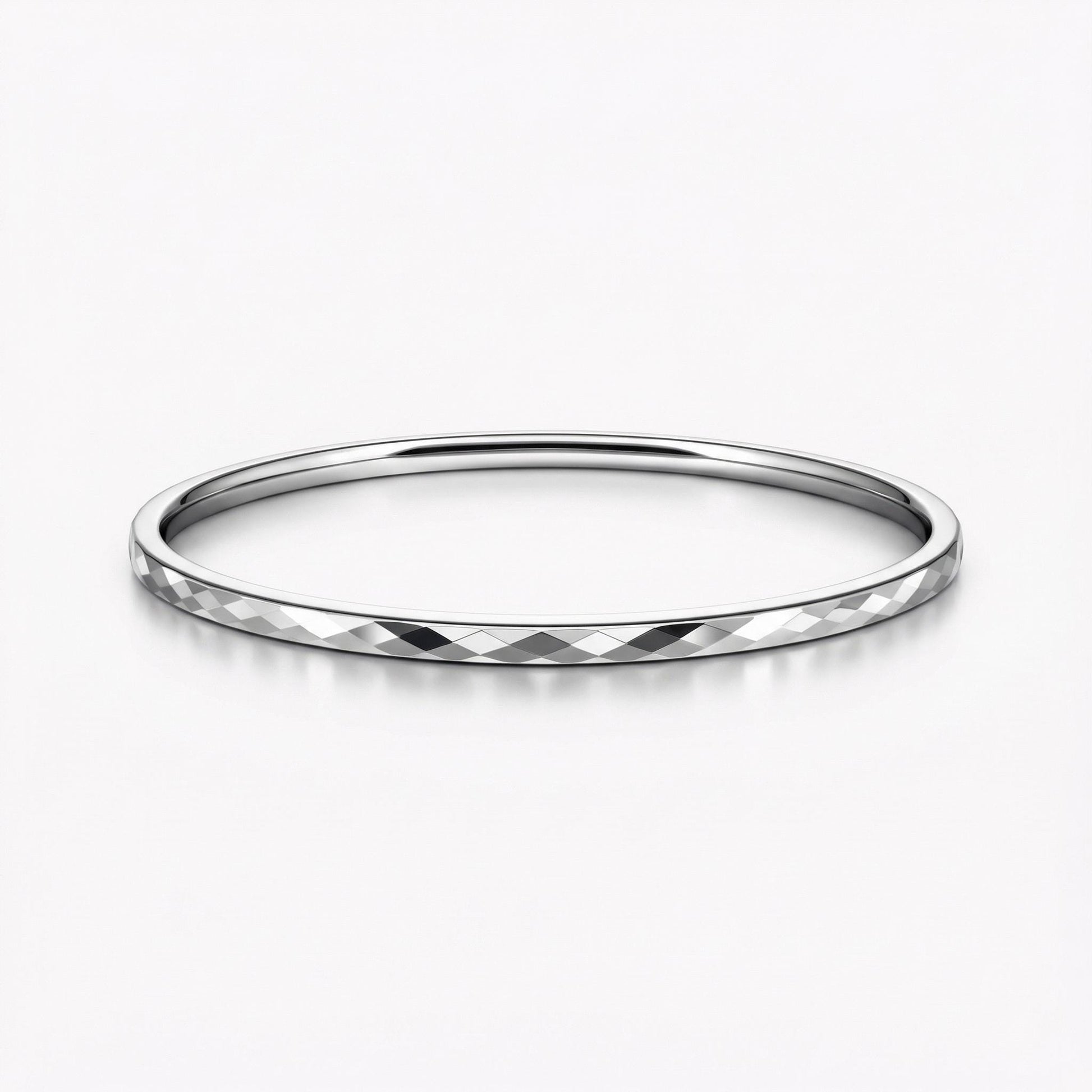 Angled view of 3mm faceted platinum bangle