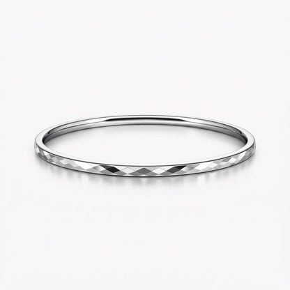 Angled view of 3mm faceted platinum bangle