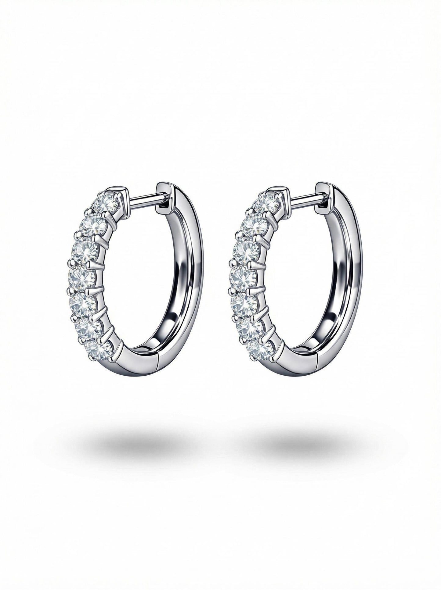 Angled pair of PT950 platinum lab diamond huggie earrings