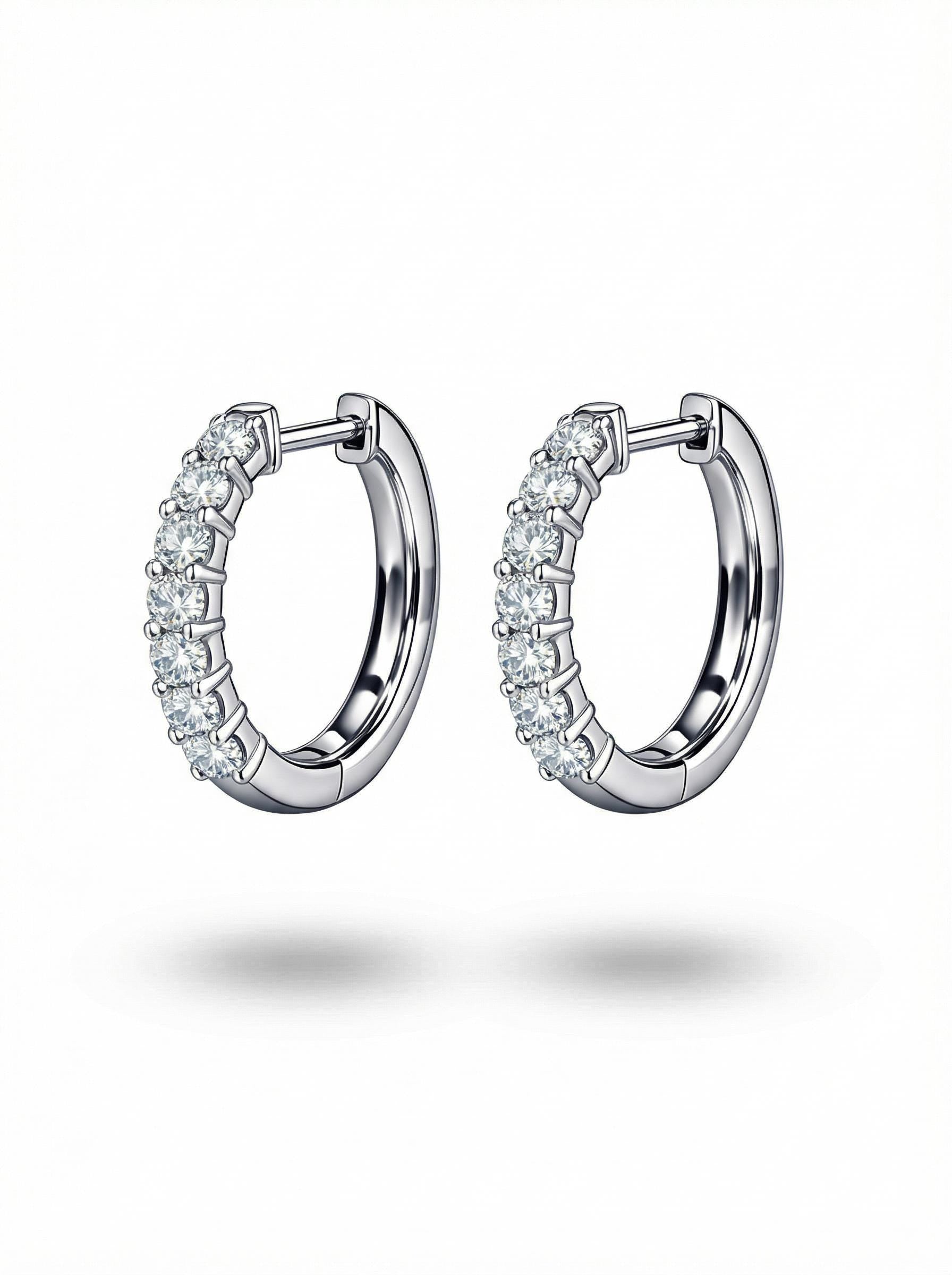Angled pair of PT950 platinum lab diamond huggie earrings