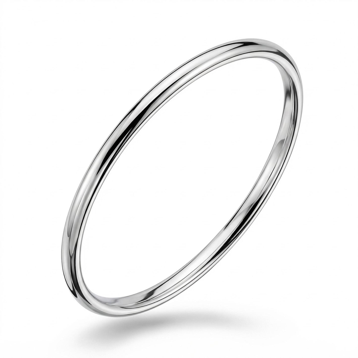Angled view of polished solid platinum bangle