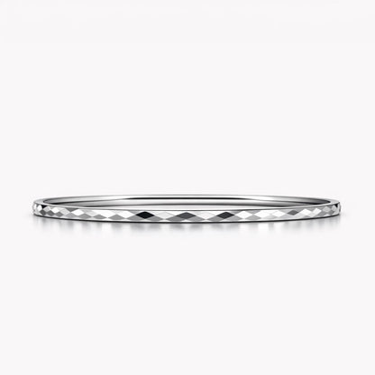 Solid PT950 platinum geometric faceted bangle 3mm on white