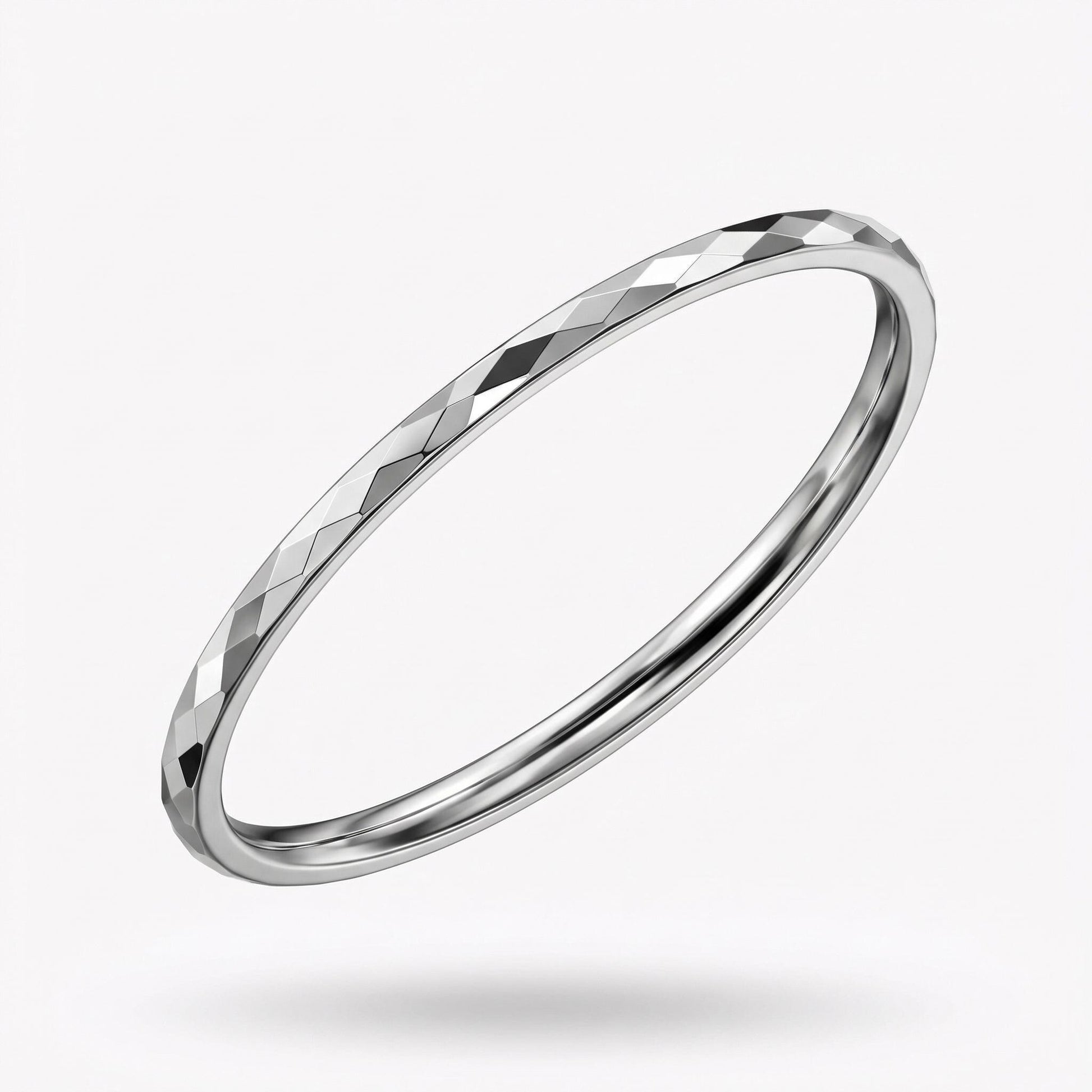 Side view of solid PT950 faceted bangle