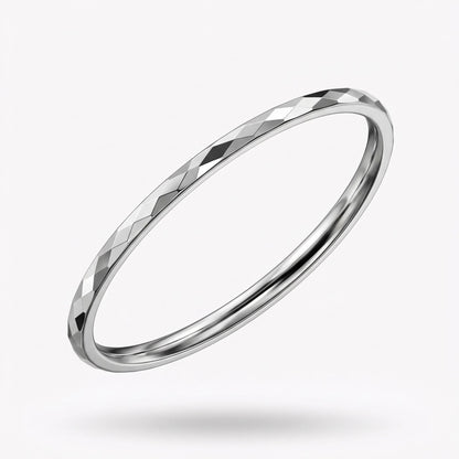Side view of solid PT950 faceted bangle