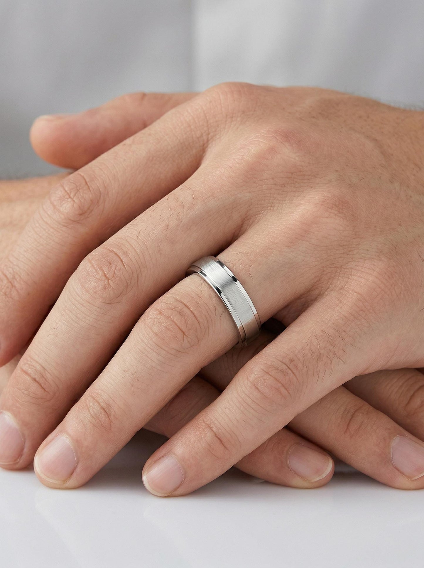 PT950 platinum brushed comfort fit wedding band 5mm angled view