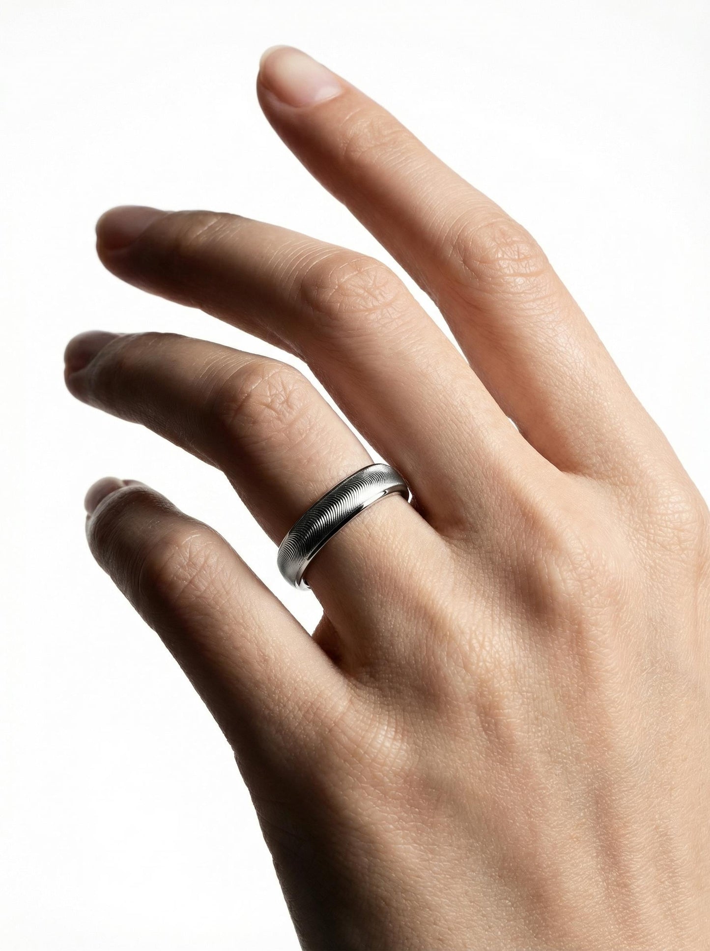 PT950 platinum wave textured wedding band 3mm close-up detail
