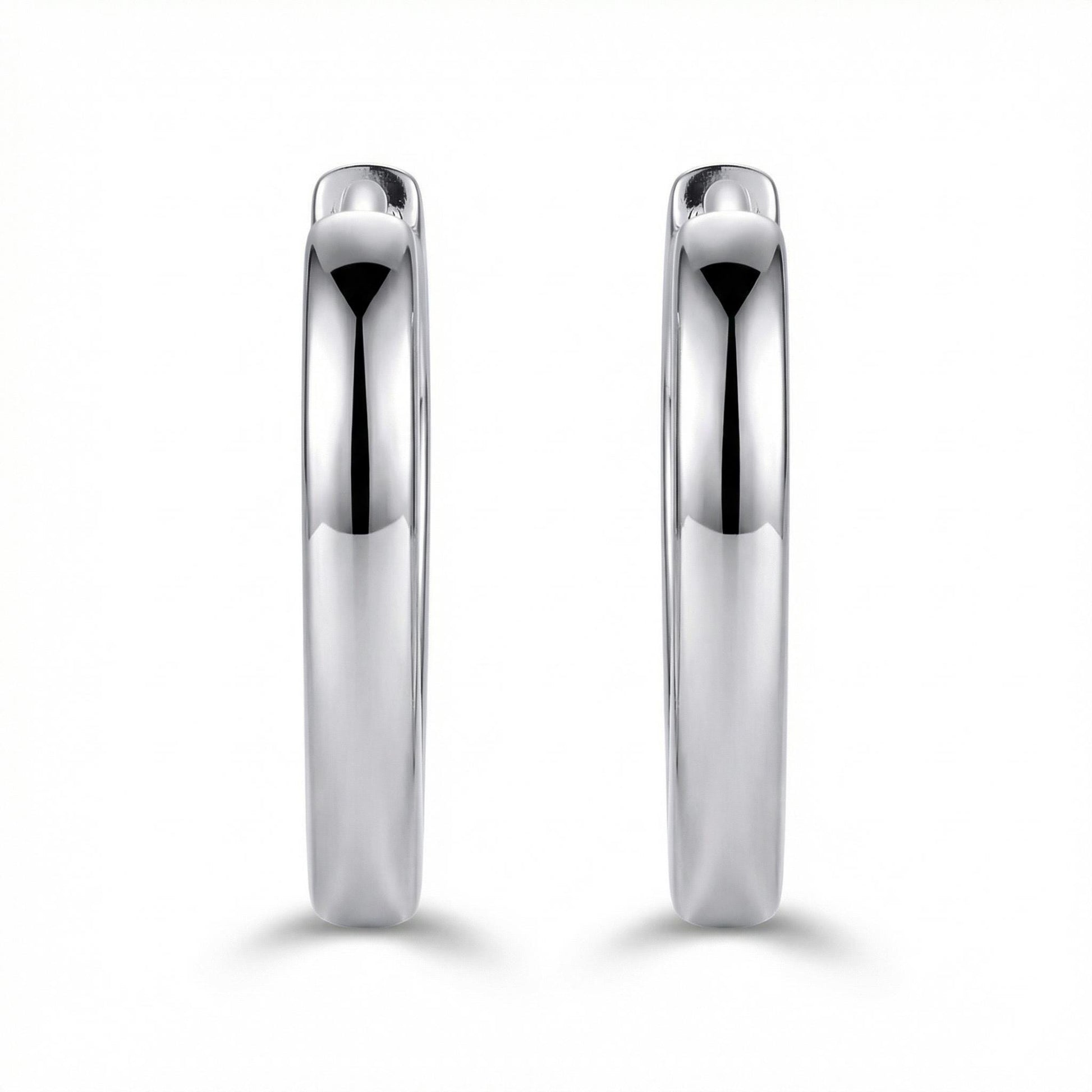 Side view of solid PT950 teardrop huggie earrings