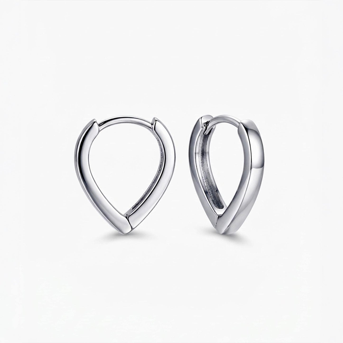 Solid PT950 platinum teardrop huggie hoop earrings on white