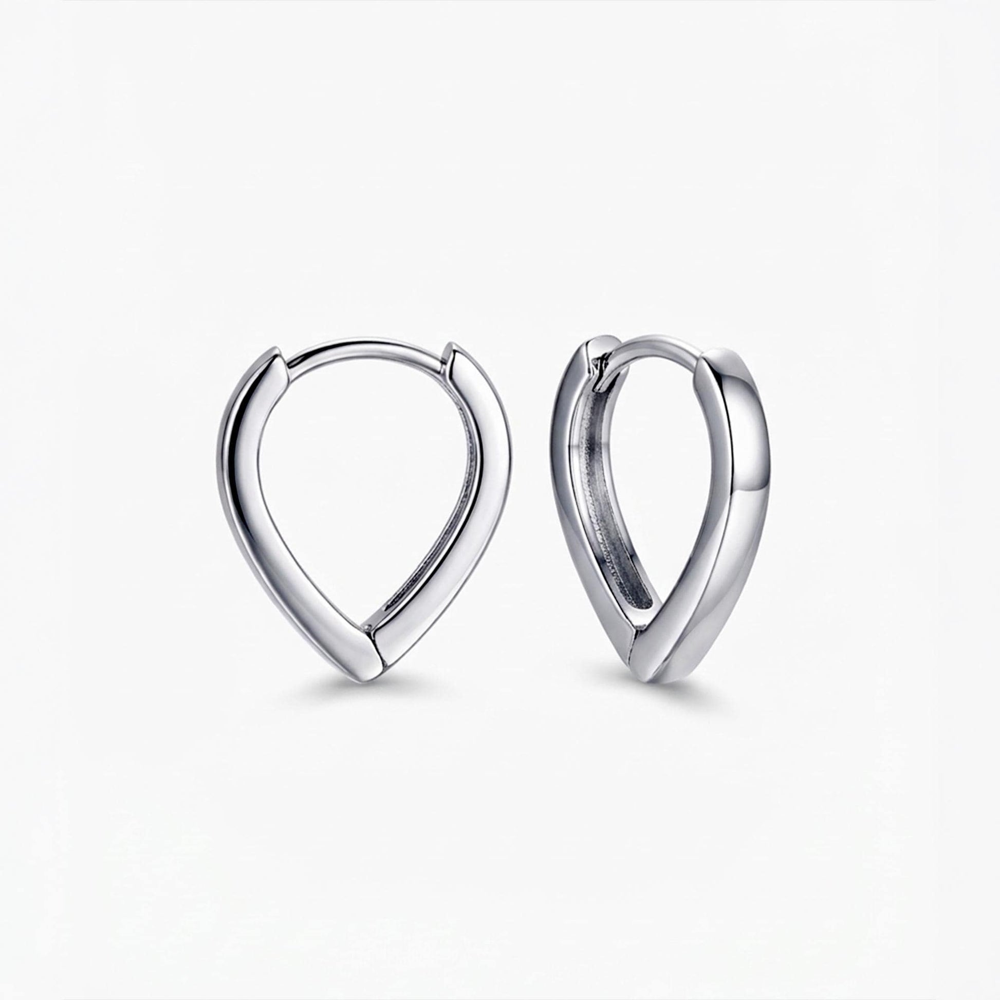 Solid PT950 platinum teardrop huggie hoop earrings on white