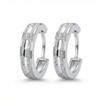 Front pair of PT950 sandblasted channel huggie earrings