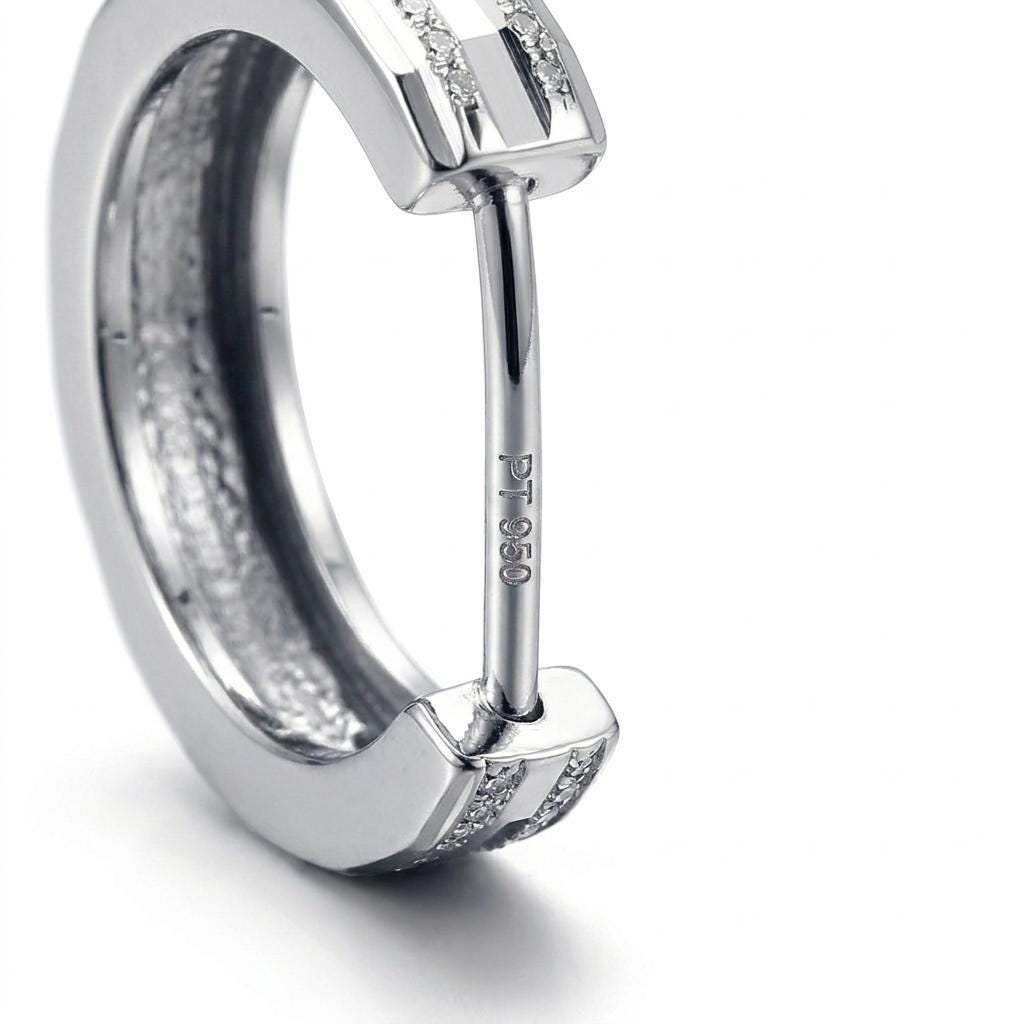 PT950 stamp and hinged post on a textured huggie hoop