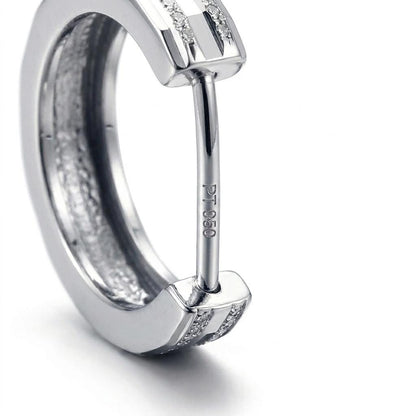 PT950 stamp and hinged post on a textured huggie hoop