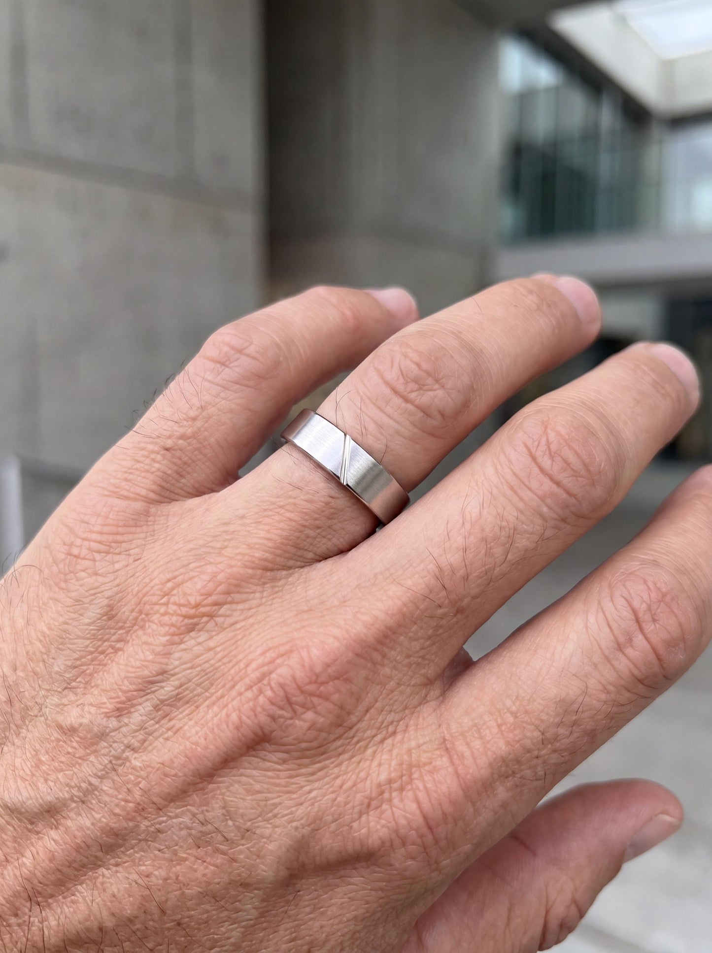 PT950 platinum brushed matte wedding band 5mm worn view