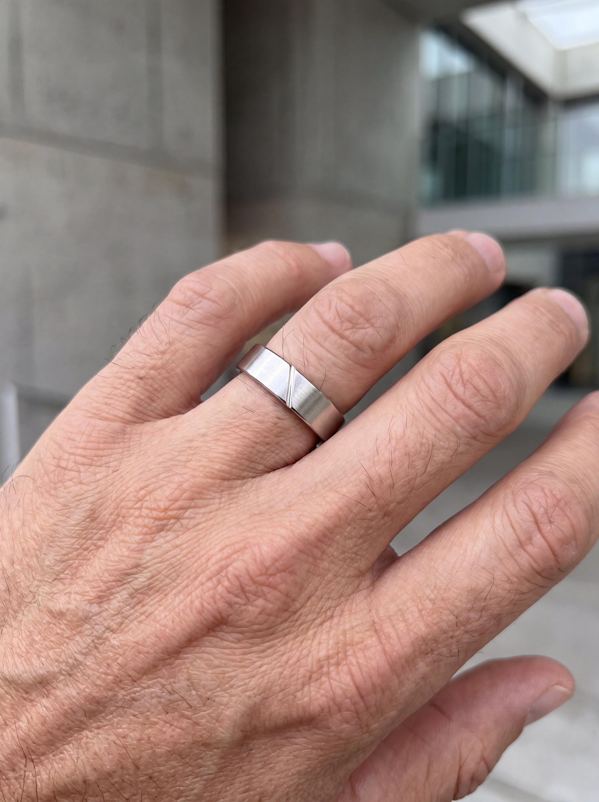PT950 platinum brushed matte wedding band 5mm worn view