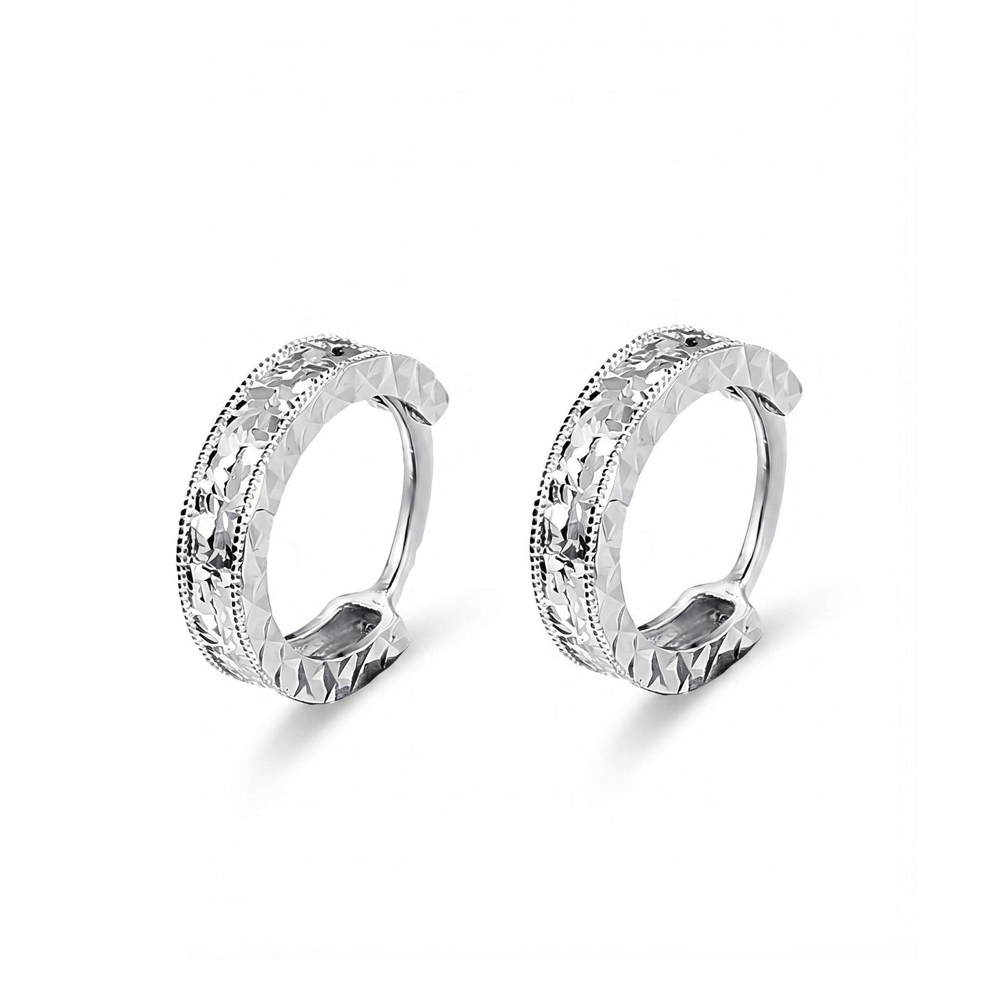 Angled pair of PT950 diamond-cut huggie hoop earrings