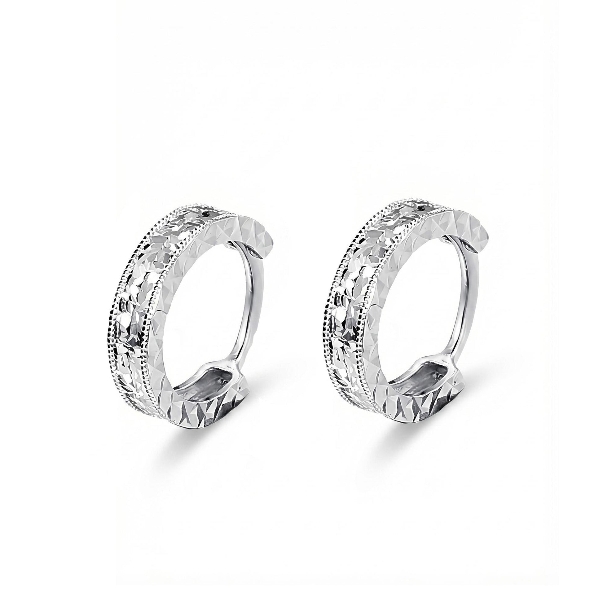 Angled pair of PT950 diamond-cut huggie hoop earrings