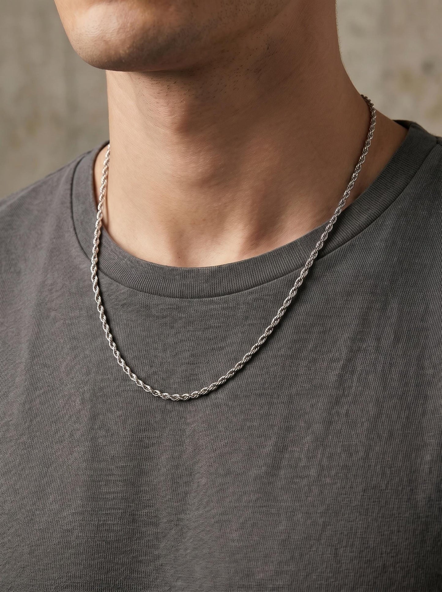 Man wearing PT950 platinum rope chain necklace with grey T-shirt