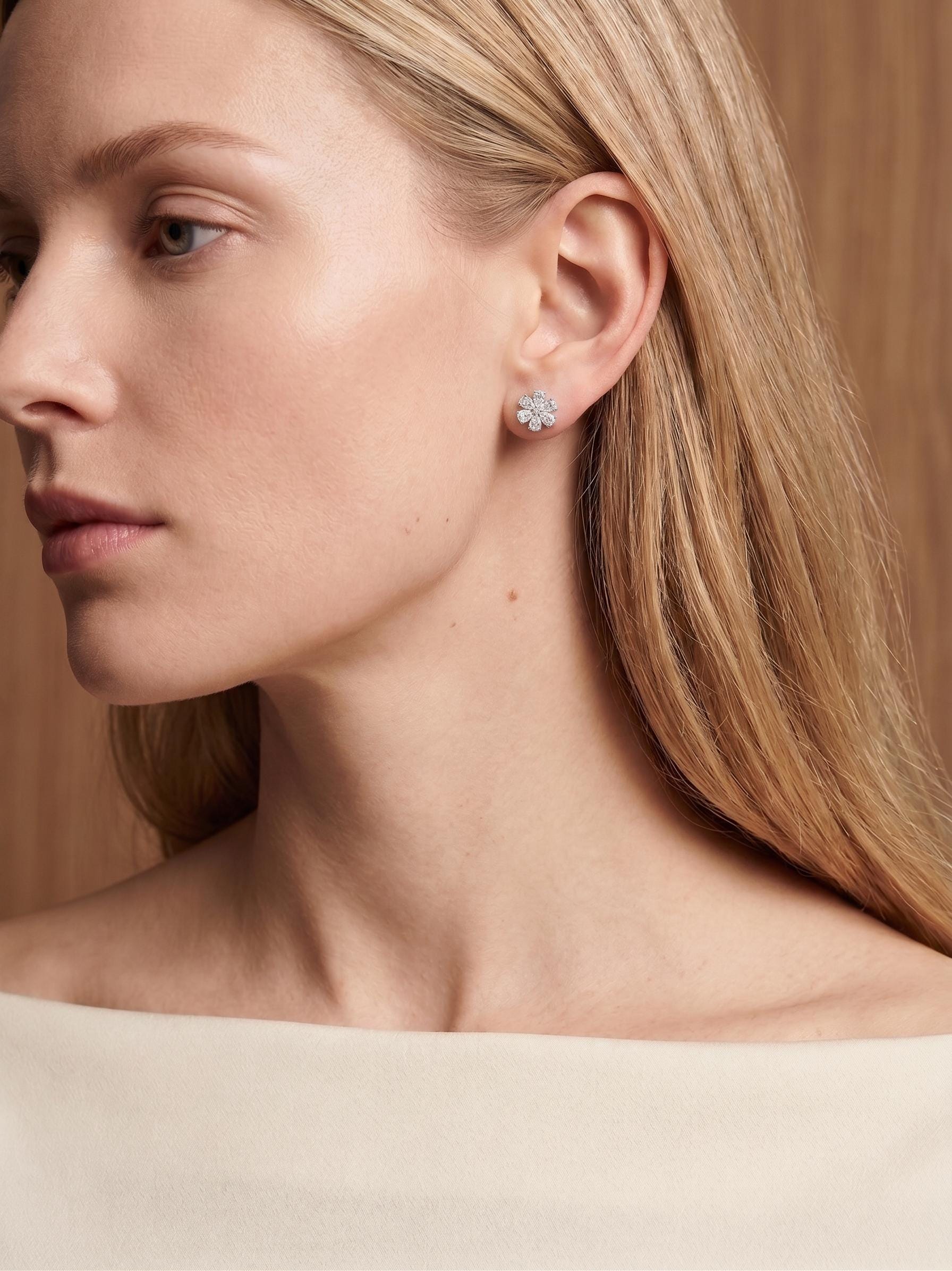 Model wearing PT950 platinum lab diamond flower stud earrings