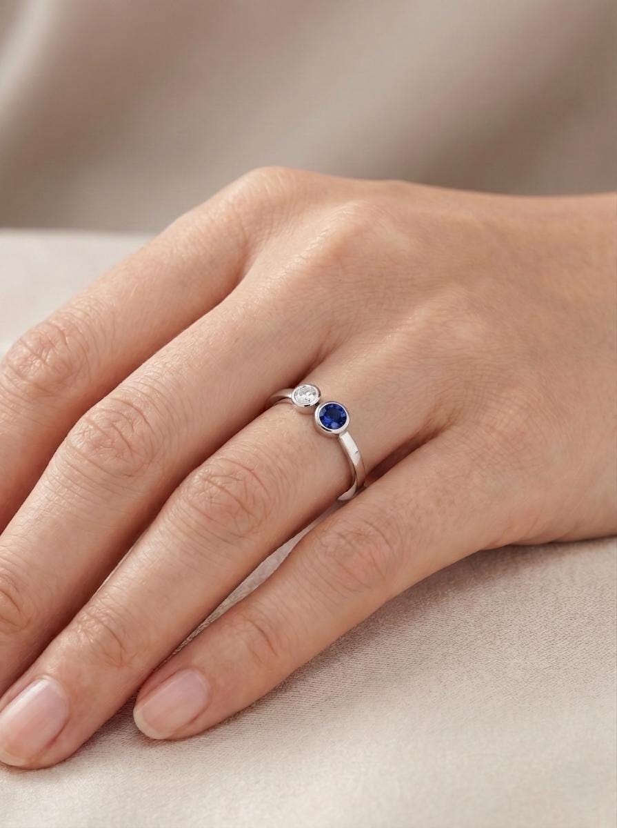 PT950 platinum Toi et Moi sapphire and diamond ring angled view