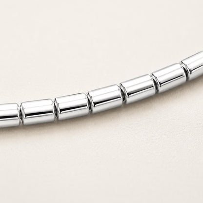 Macro detail of polished platinum barrel links