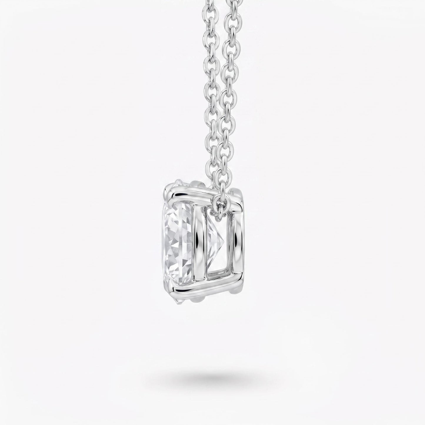 Side profile of four-claw platinum setting for lab-grown diamond solitaire