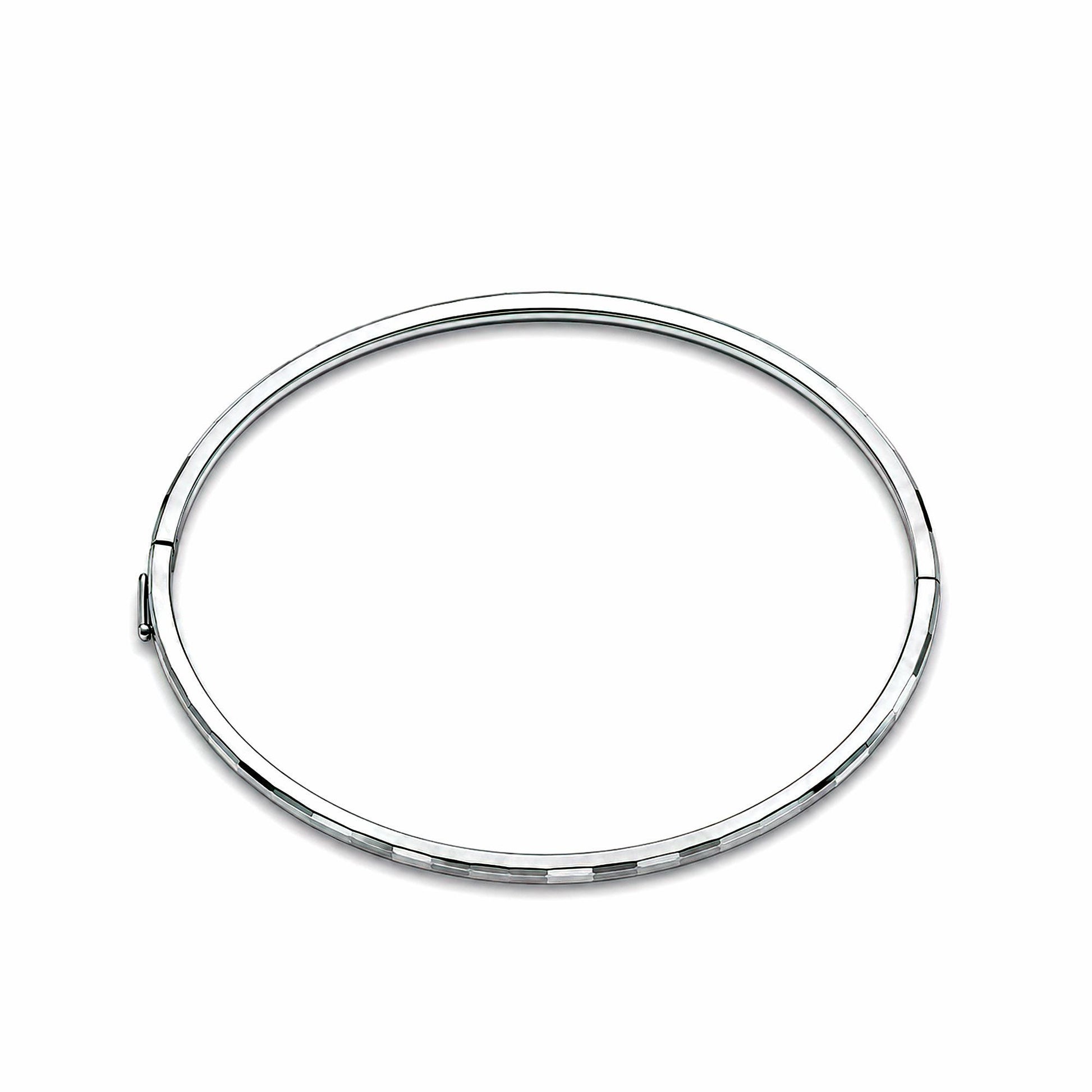Open view showing hinge on oval platinum bangle