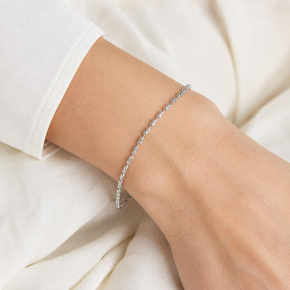 Close wrist view of textured PT950 ripple-link bracelet