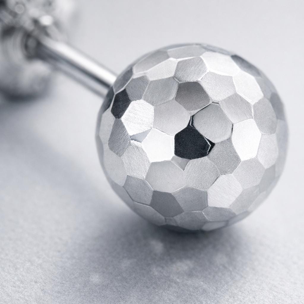 Macro view of precision facets on a PT950 platinum ball stud