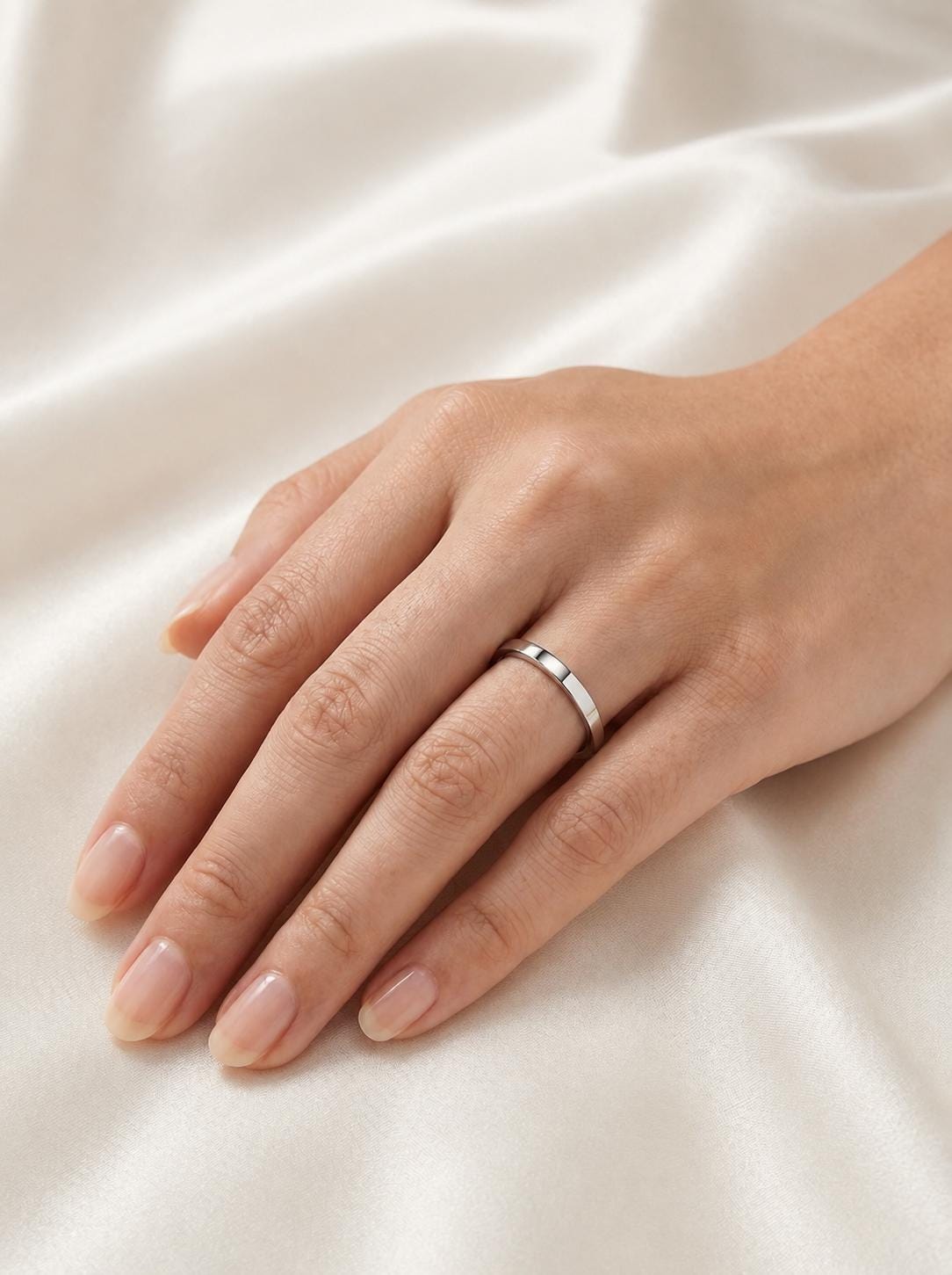PT950 platinum flat court wedding band in 1.5mm 2mm or 2.5mm worn view