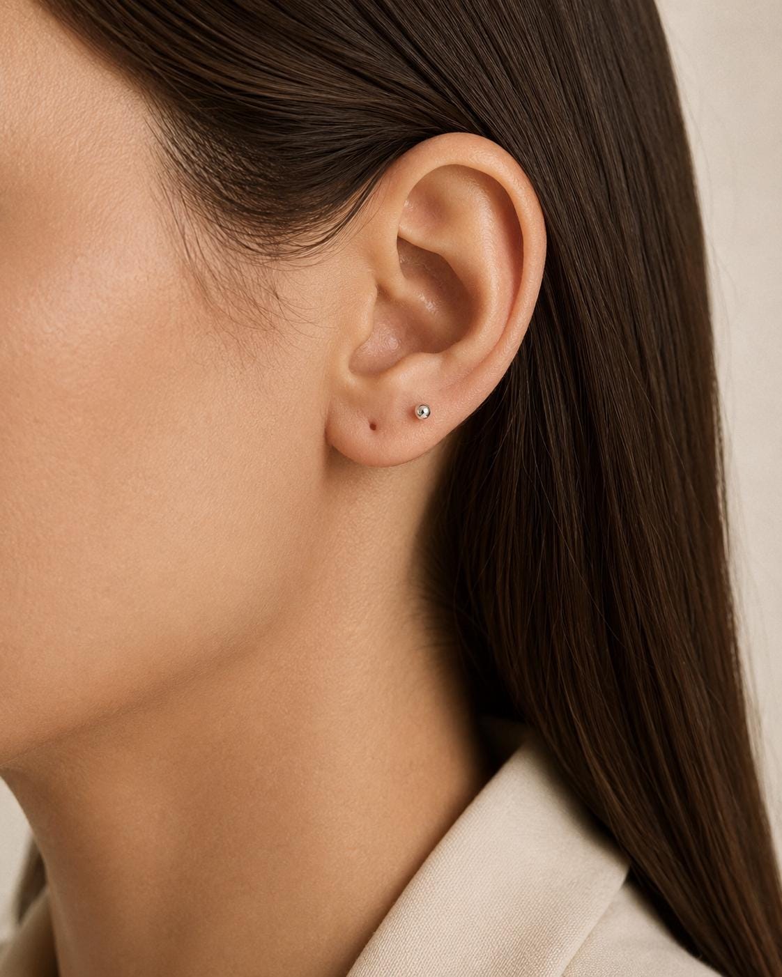 Side ear view of a 2mm solid PT950 platinum ball stud