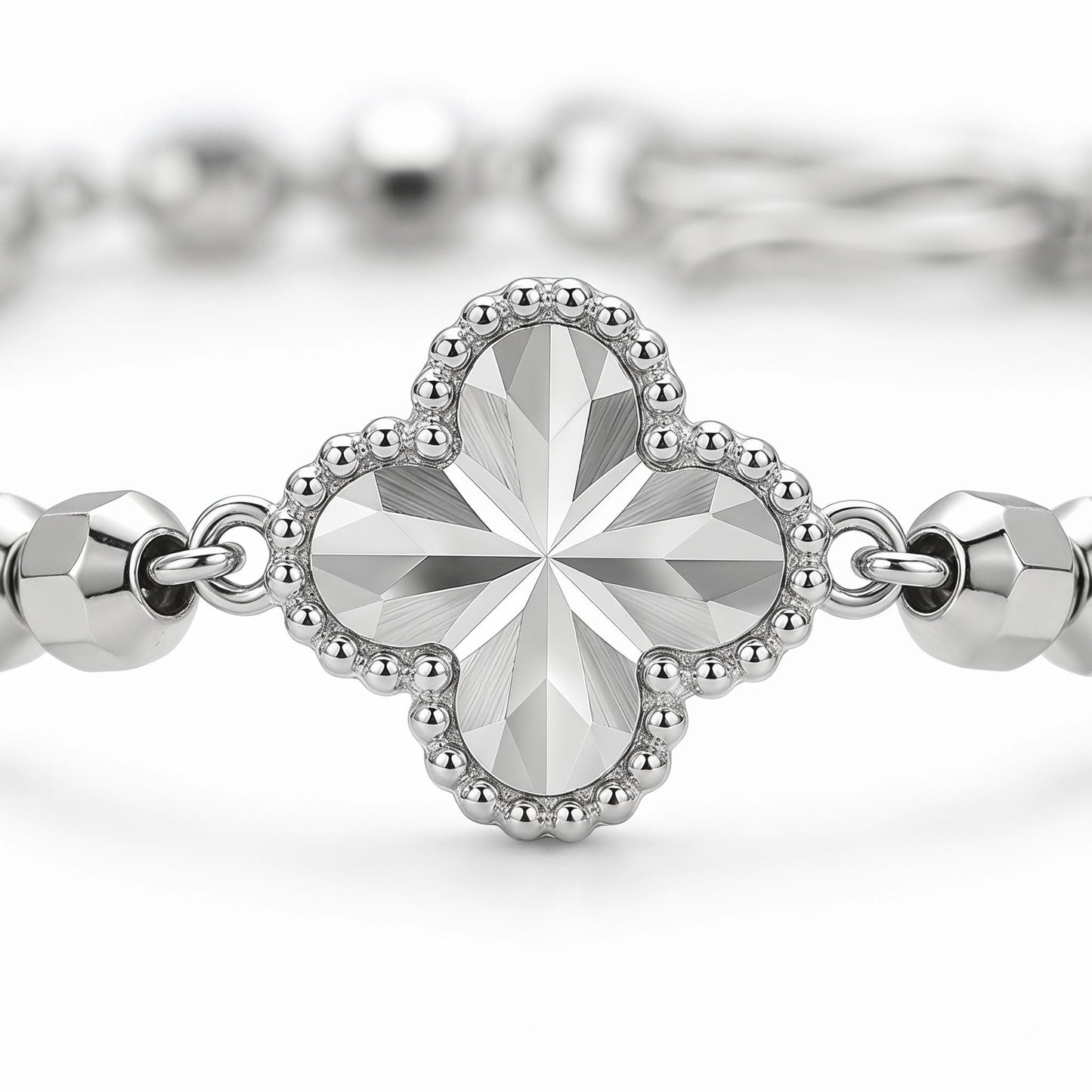 Macro detail of 7mm platinum clover motif