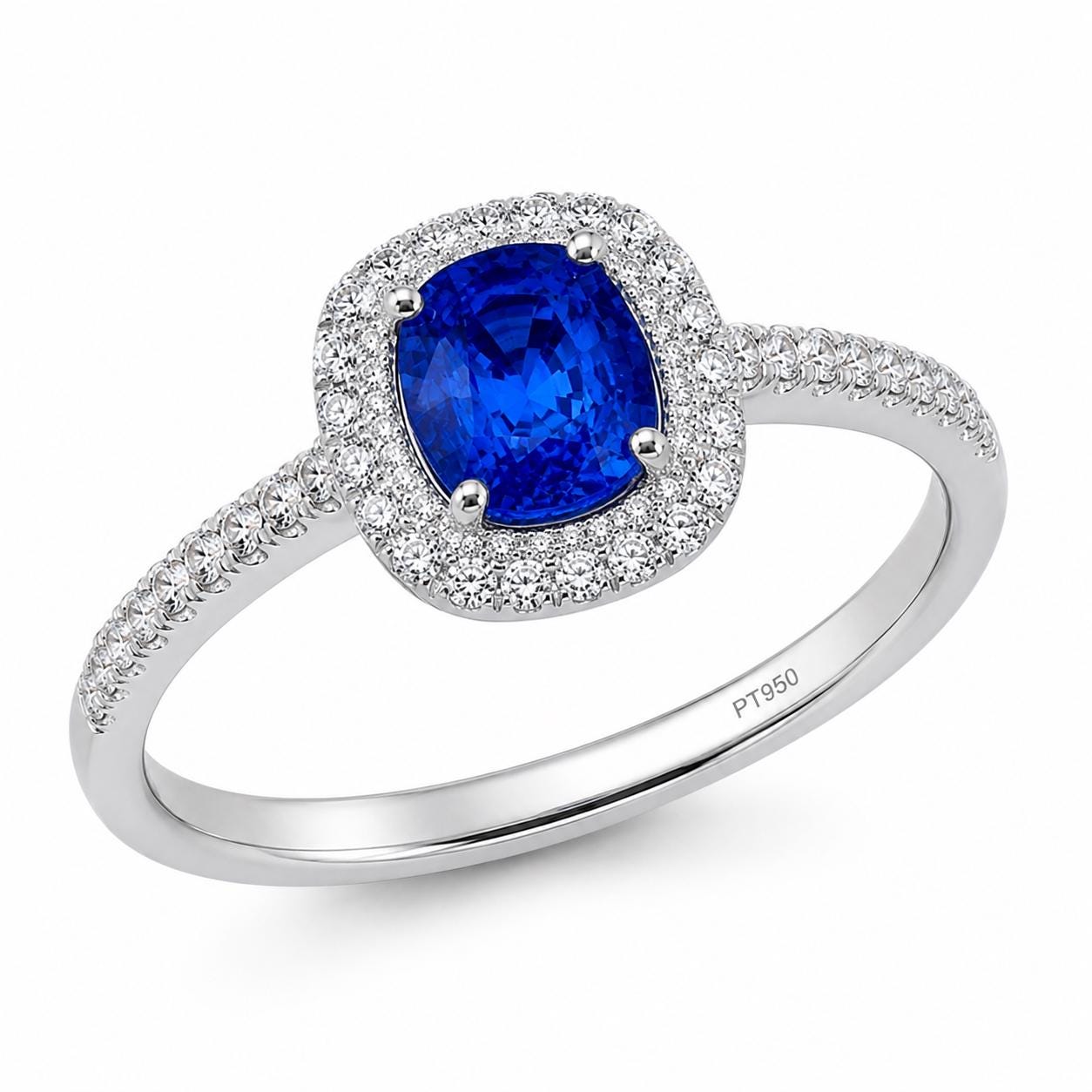 deep blue sapphire and diamond halo ring in PT950 platinum on-hand view