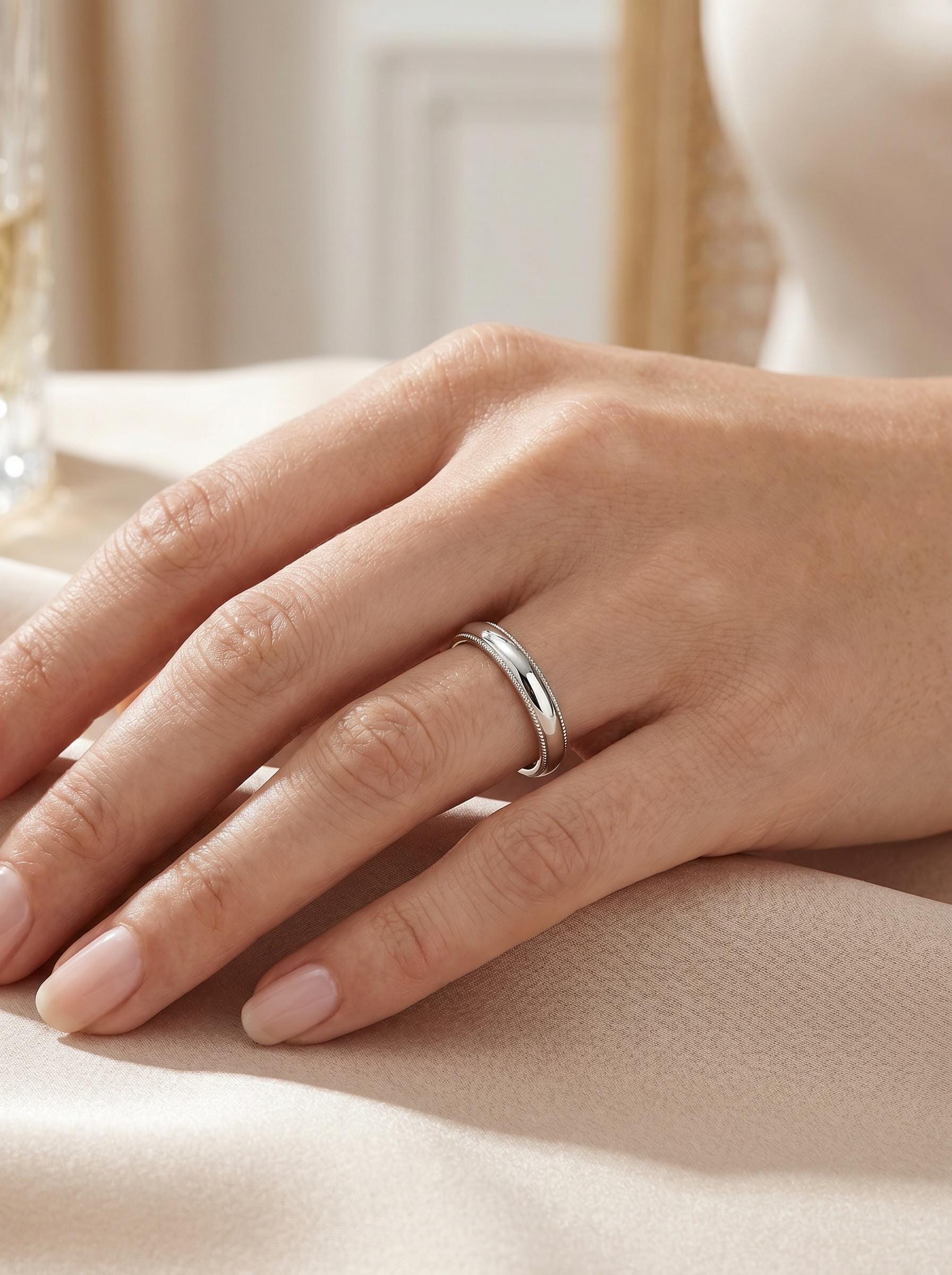 PT950 platinum milgrain wedding band 3mm angled view
