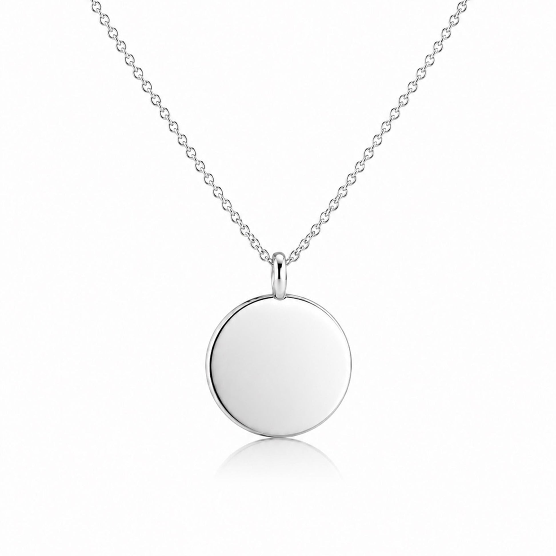 Front view of blank 15mm solid platinum disc pendant