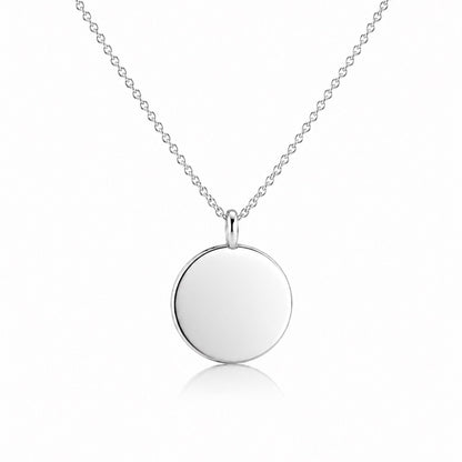 Front view of blank 15mm solid platinum disc pendant