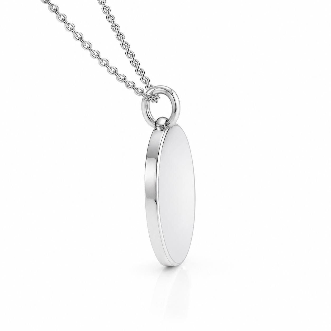 Side profile of 1.5mm-thick platinum disc pendant