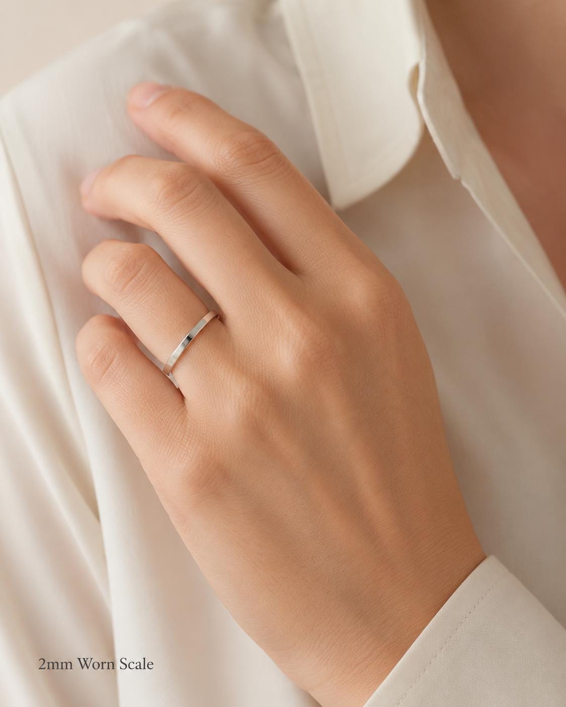 PT950 platinum flat court wedding band in 1.5mm 2mm or 2.5mm on-hand view