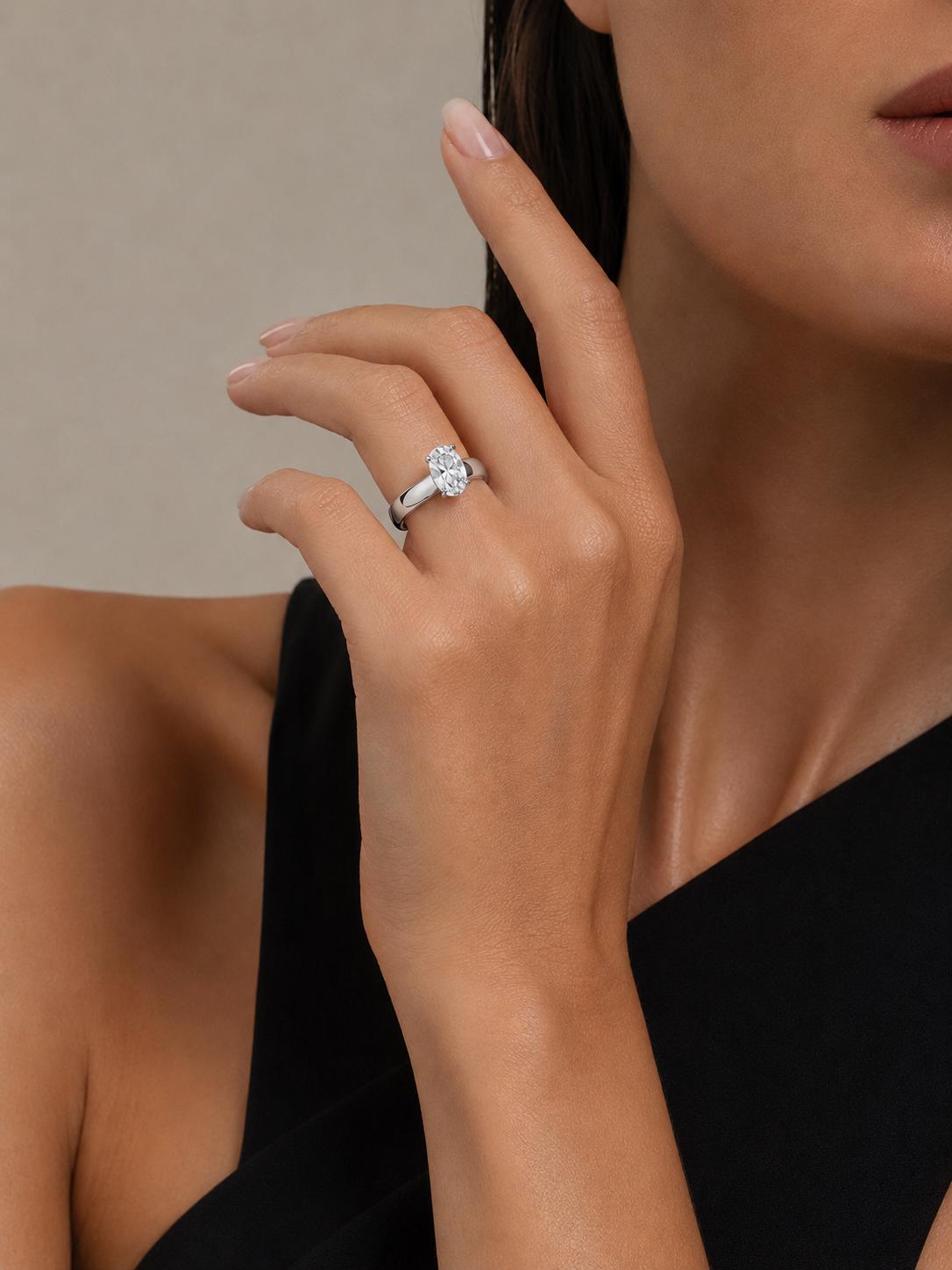 PT950 platinum oval lab diamond solitaire ring on hand