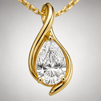 Macro detail of pear lab-grown diamond in yellow gold twist setting