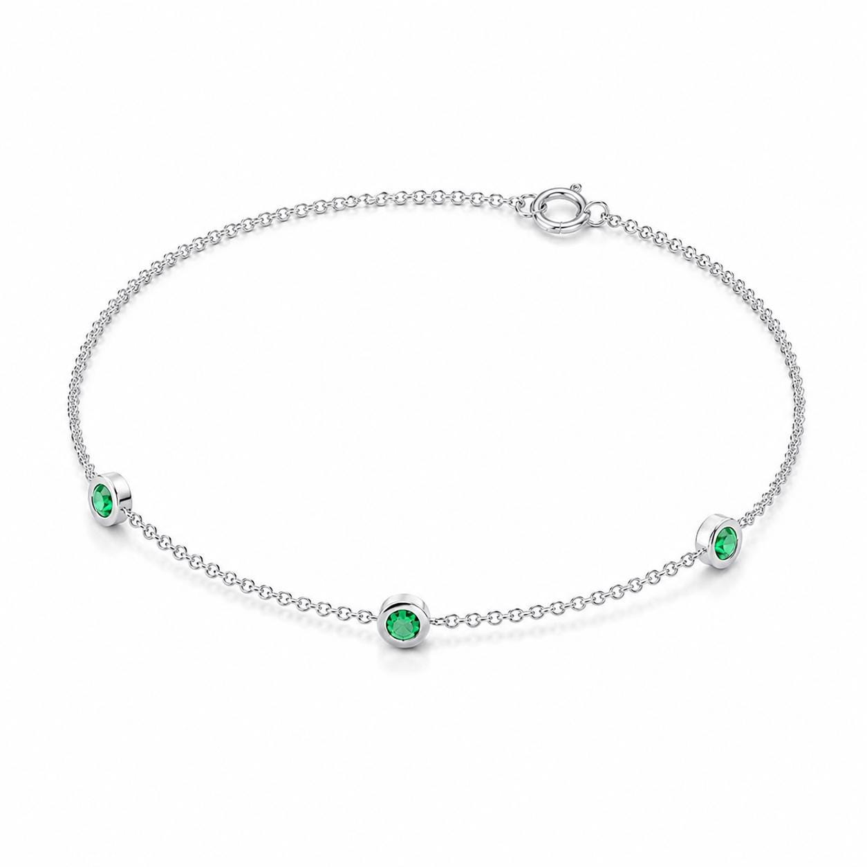 Full view of PT950 natural emerald three-stone bracelet